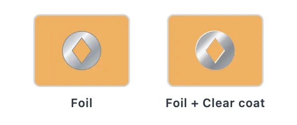 A silver foil logo, next to the same foil logo with a glossy clear coat over it
